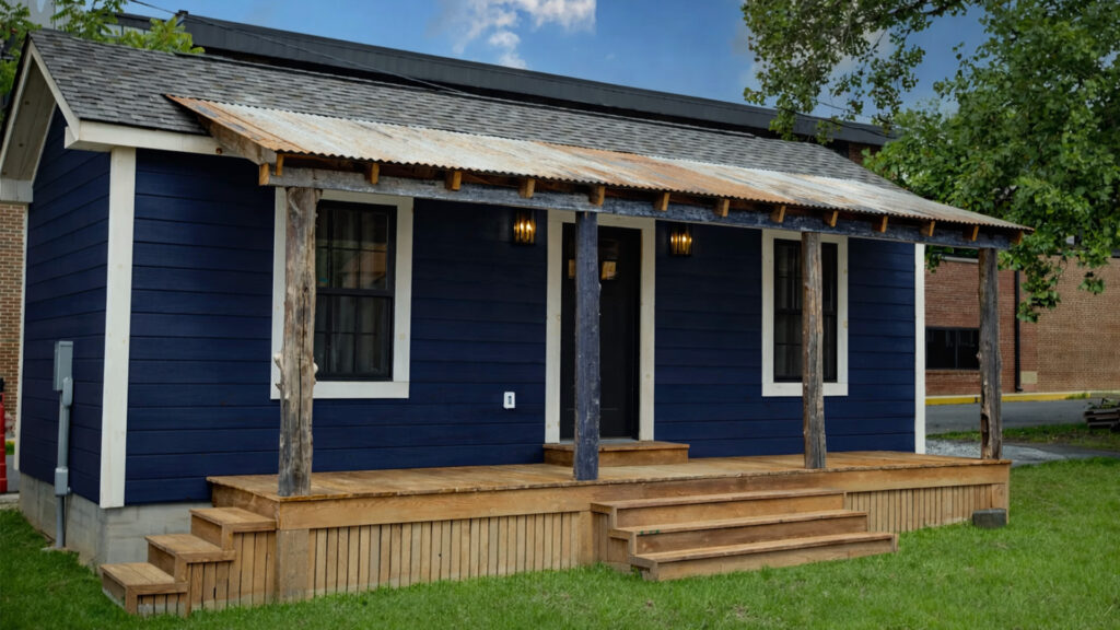 Custom navy blue cabin built by Barnwood Living